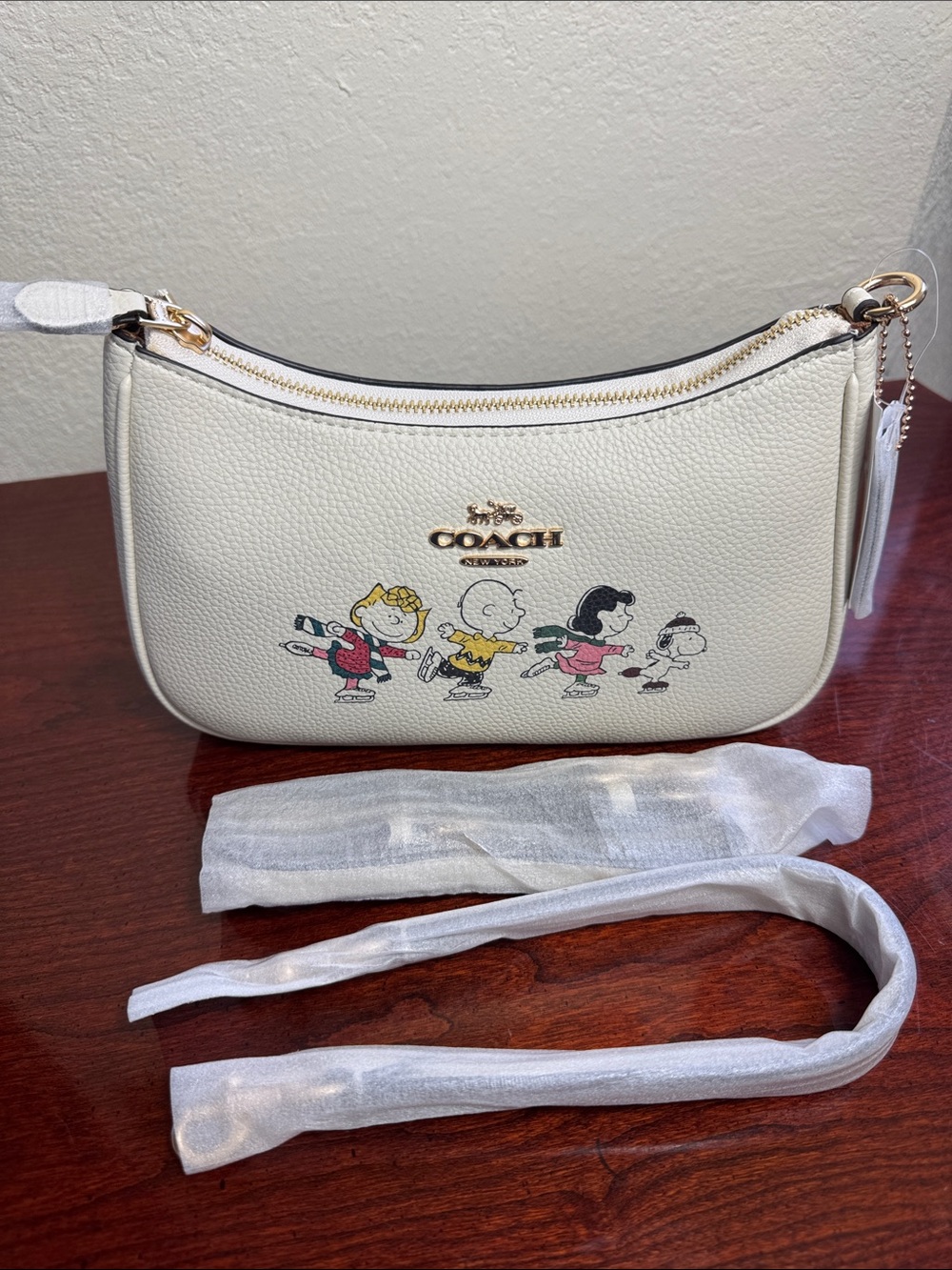 Coach X Peanuts Teri With Snoopy And Friends Motifs Cream Mini Bag.
